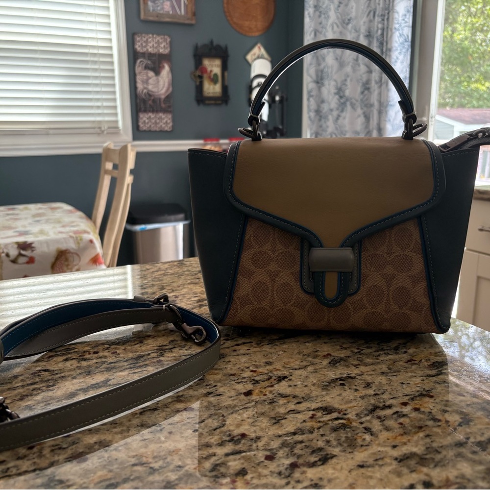 Last call!!! Coach Courier Carryall bag with crossbody.  Pristine!!!